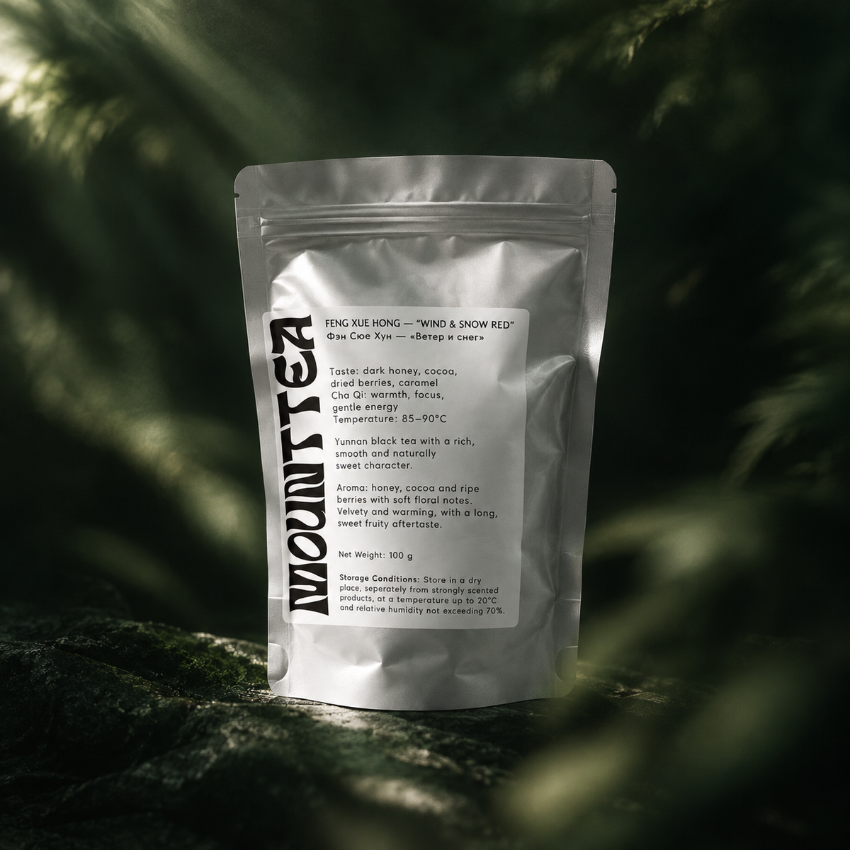 Feng Xue Hong black tea pouch on a moss-covered surface