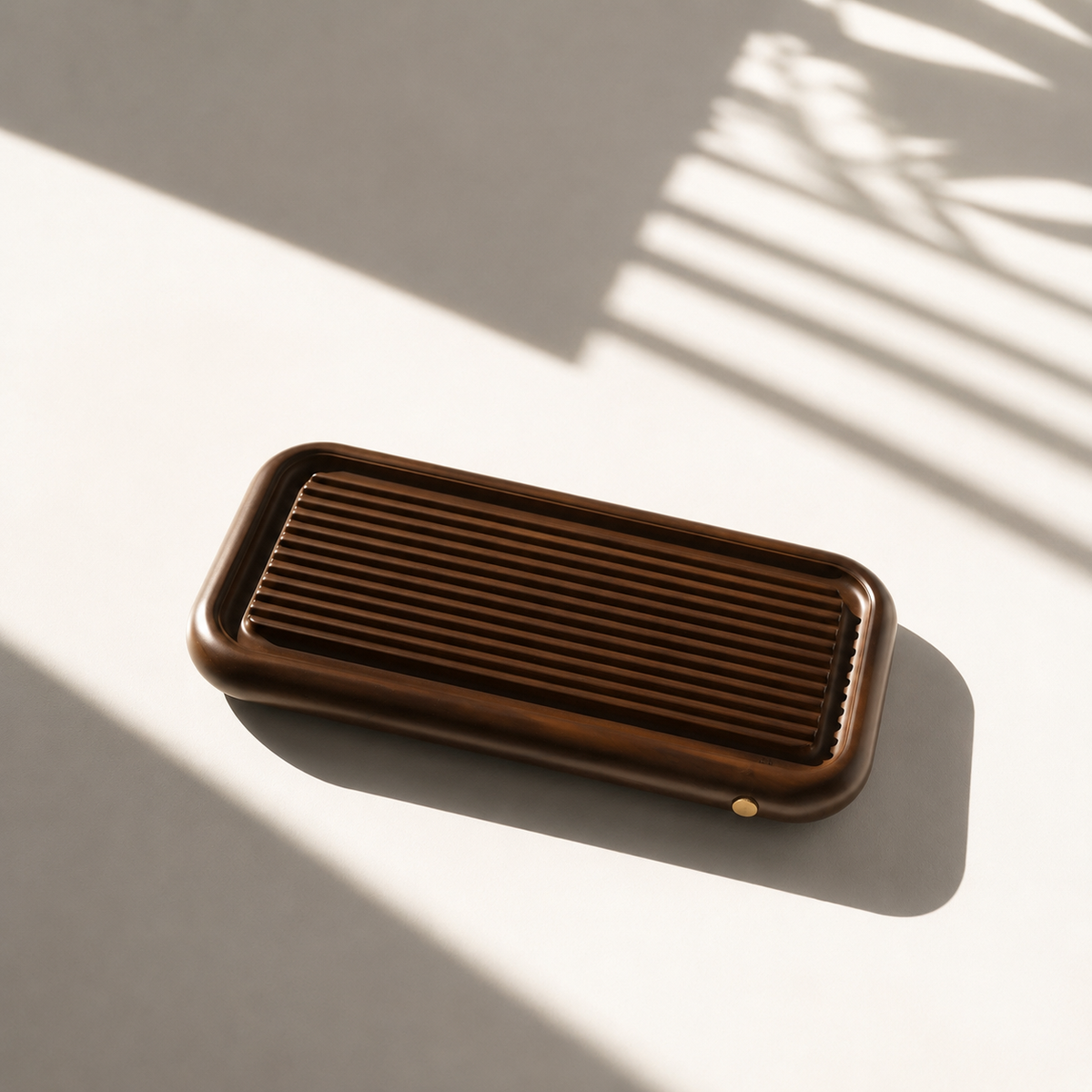 Rectangular Chaban bamboo tea tray casting a shadow