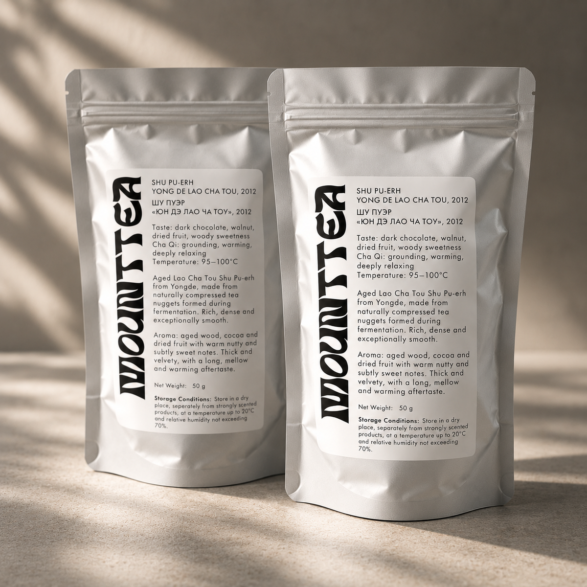 Two MOUNTTEA Yongde Lao Cha Tou Pu-erh pouches