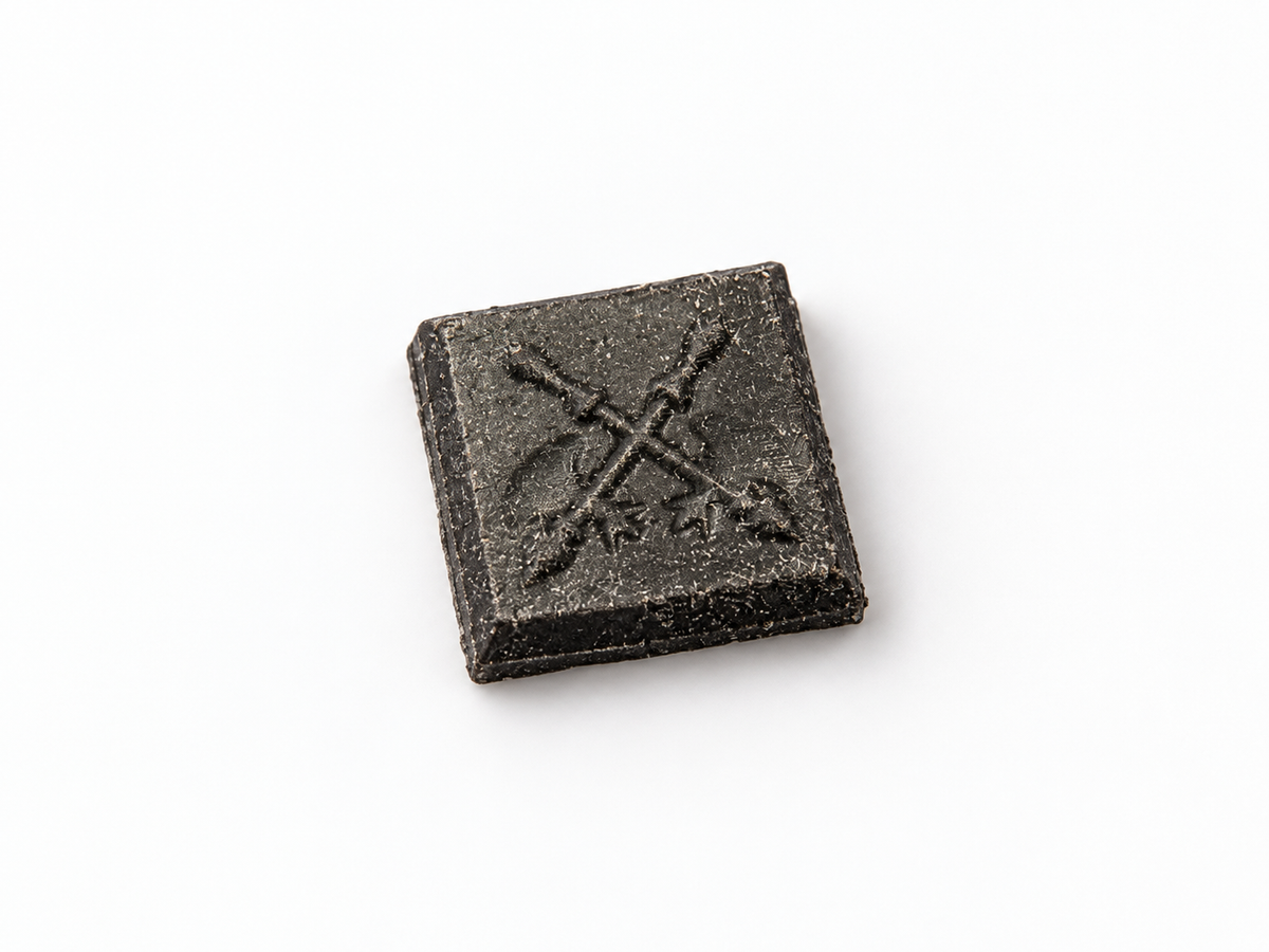 Single square piece of GABA tea resin on a white background