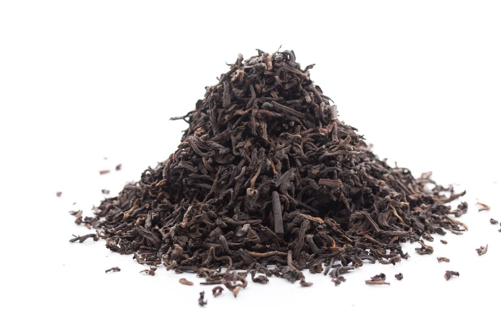 Pu-erh maduro envelhecido com notas Chen Xiang balsâmicas, de frutos de casca rija, madeira, resina, musgo e especiarias
