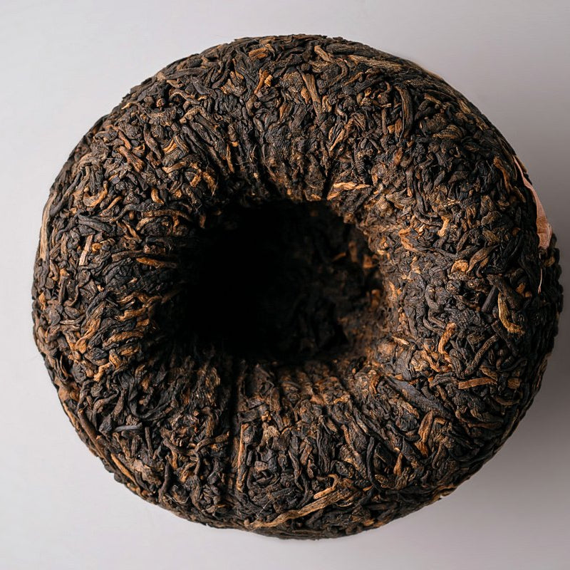 Dayi V93 Shu Pu-erh Tea brewed Gongfu style with rich dark tea liquor