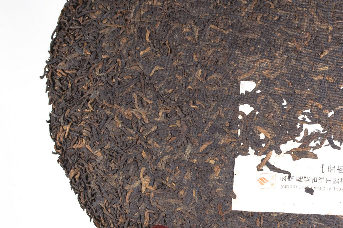 Gu Yi Gongting Pu-erh with chocolate nuts dried fruit oriental spice and oak bark notes