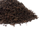 Macao Chen Nian aged Pu-erh with camphor wood resin balsamic nut and forest notes