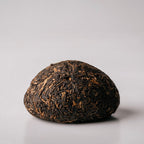 Menghai Dayi V93 Ripe Pu-erh with medium tea leaves and abundant tender buds