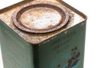 Close-up of the lid of a green Big Panda Pu-erh tea tin