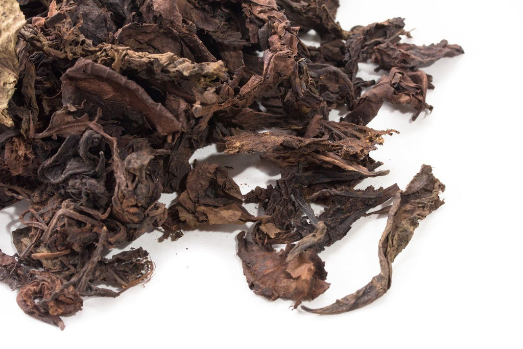 Detailed view of the dark leaves of Big Panda ripe Pu-erh